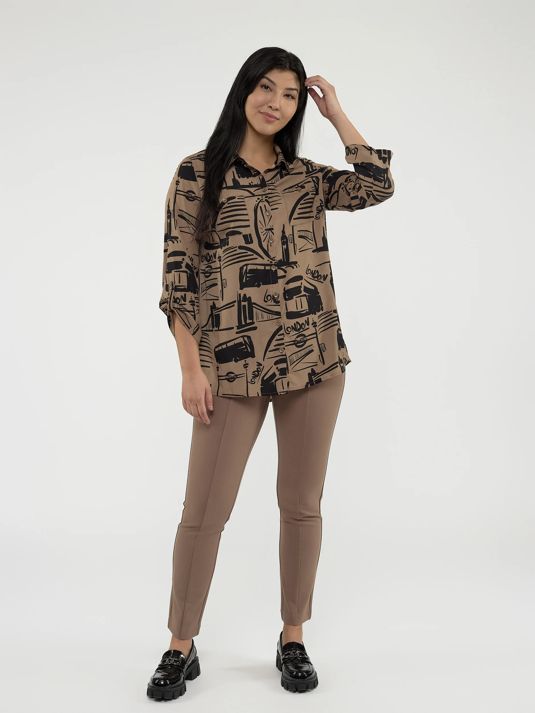 Blouse longueur tunique ample à manches 3/4 avec boutons