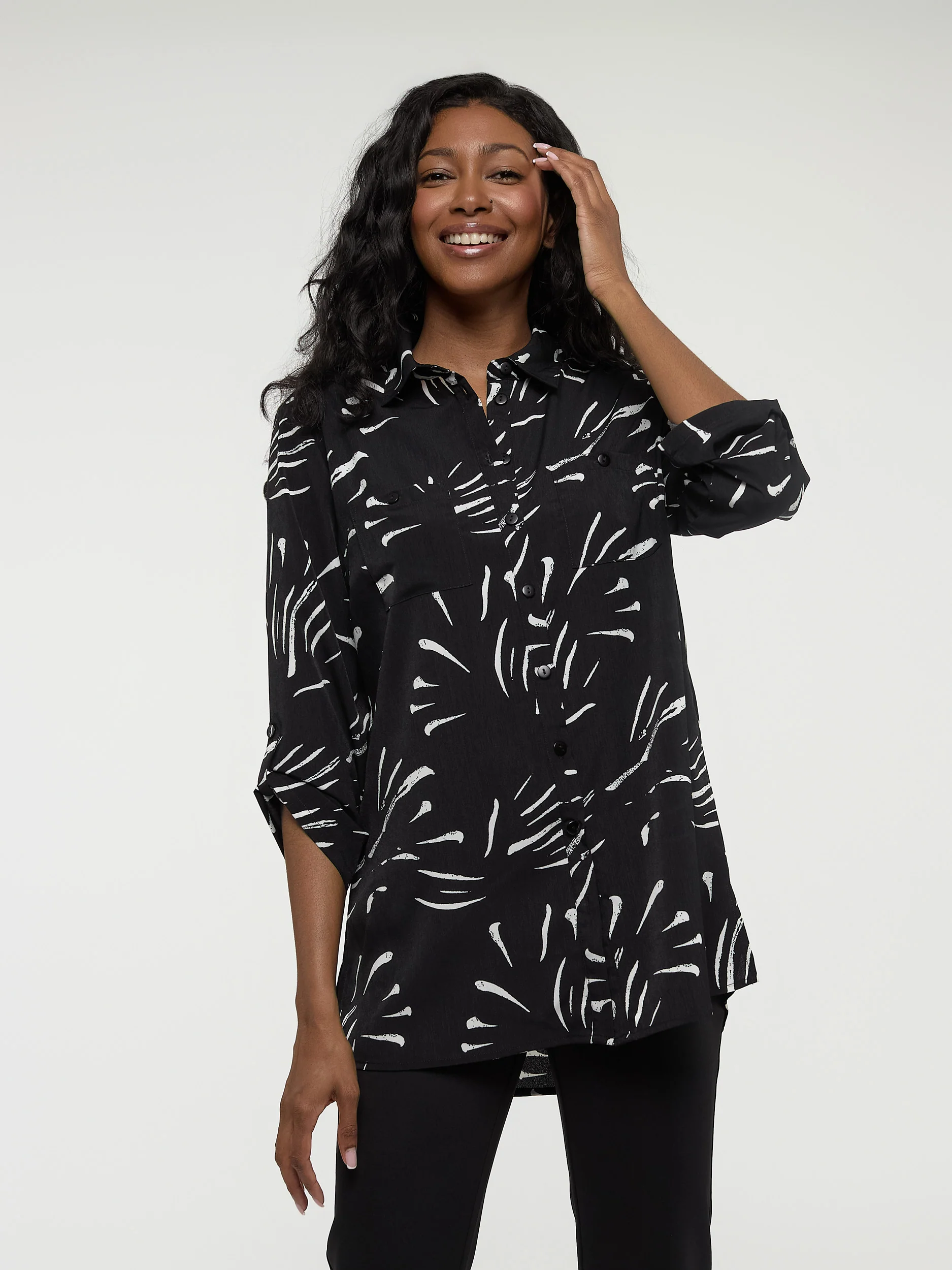 Blouse longueur tunique ample à manches 3/4 avec boutons