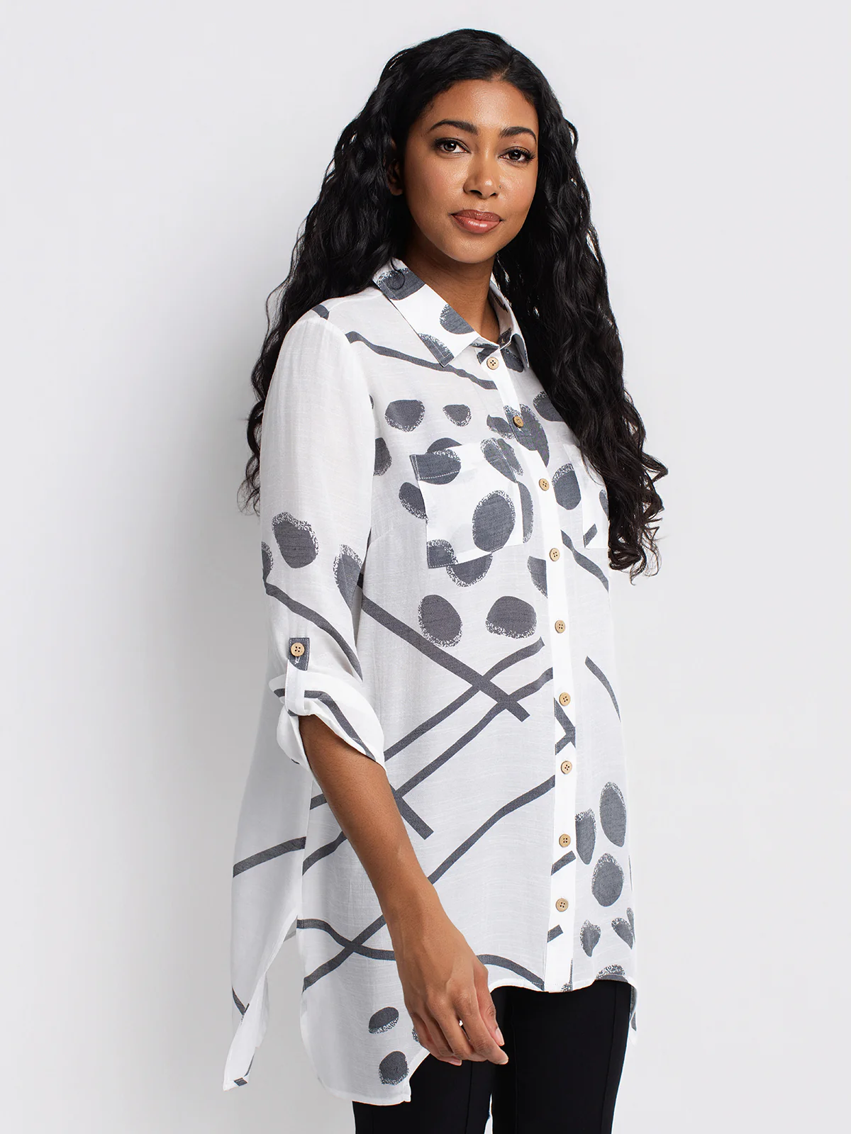 Blouse longueur tunique ample à manches 3/4 avec boutons